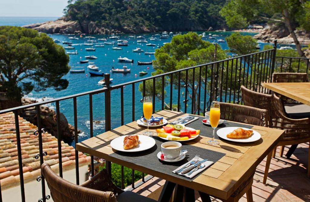 Breakfast overlooking a Costa Brava cove